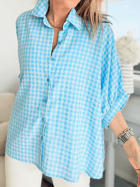 Geruite blauwe blouse