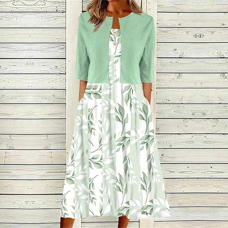 BlossomBliss® - Groene midi-jurk met zijzakken