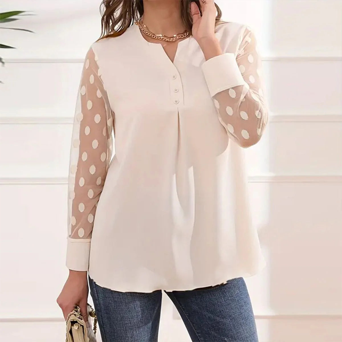 Witte blouse met stippen