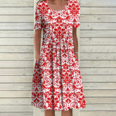 BlossomBliss® - Elegante midi-jurk met korte mouwen en rode print