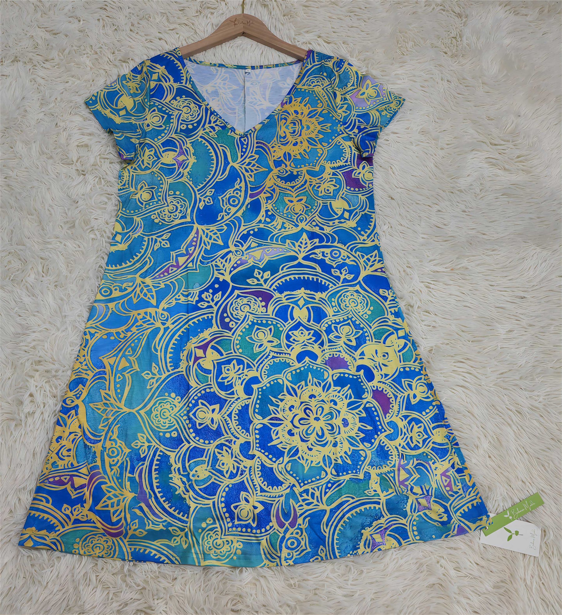 SpringStil® - Oceaanblauwe knielange mini-jurk met mandala-print en korte mouwen