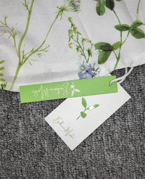 SpringStil® - Witte maxi zomerjurk met V-hals en tuinprint