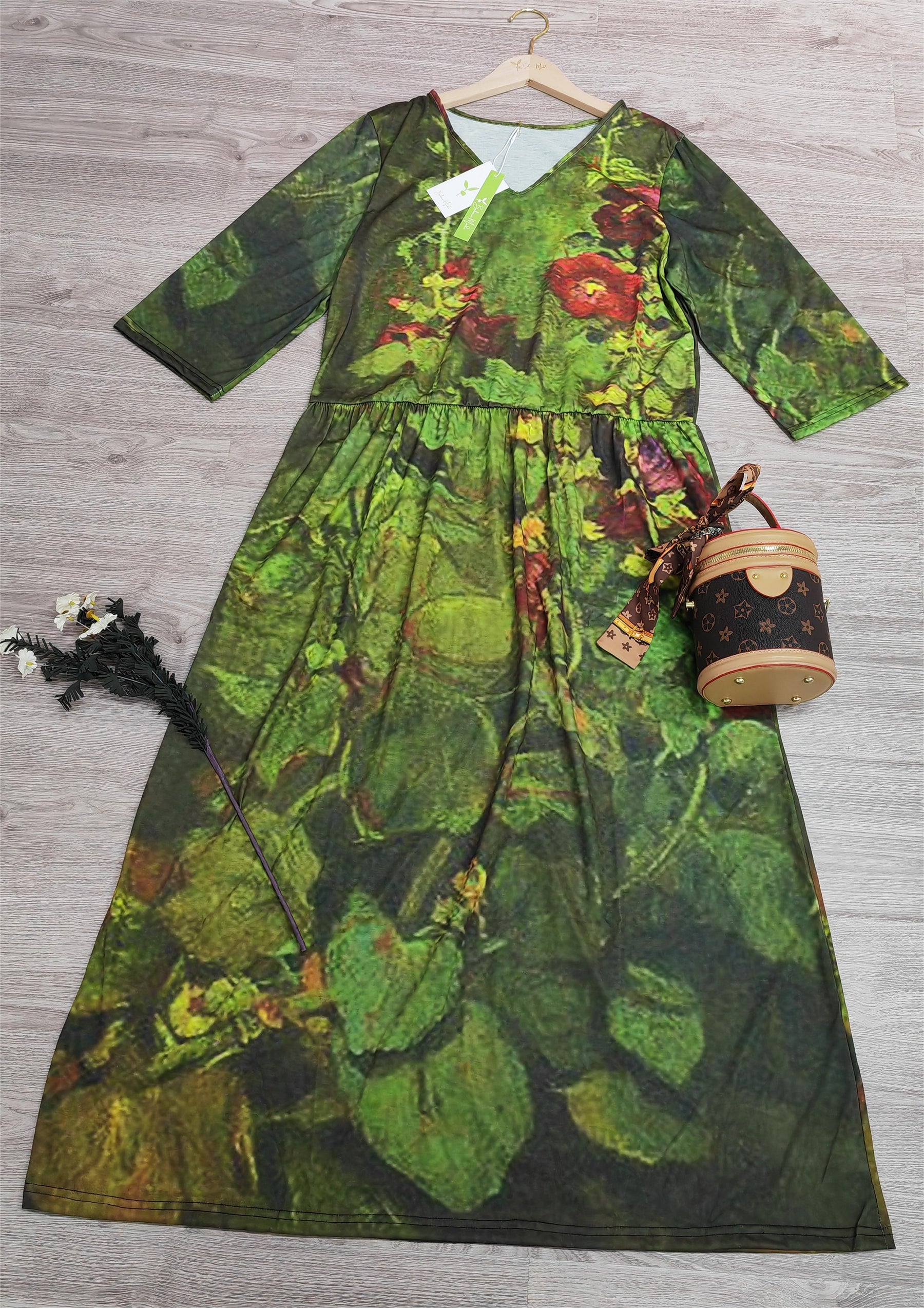 SpringStil® - Groene maxi-jurk met V-hals en 3/4 mouwen 