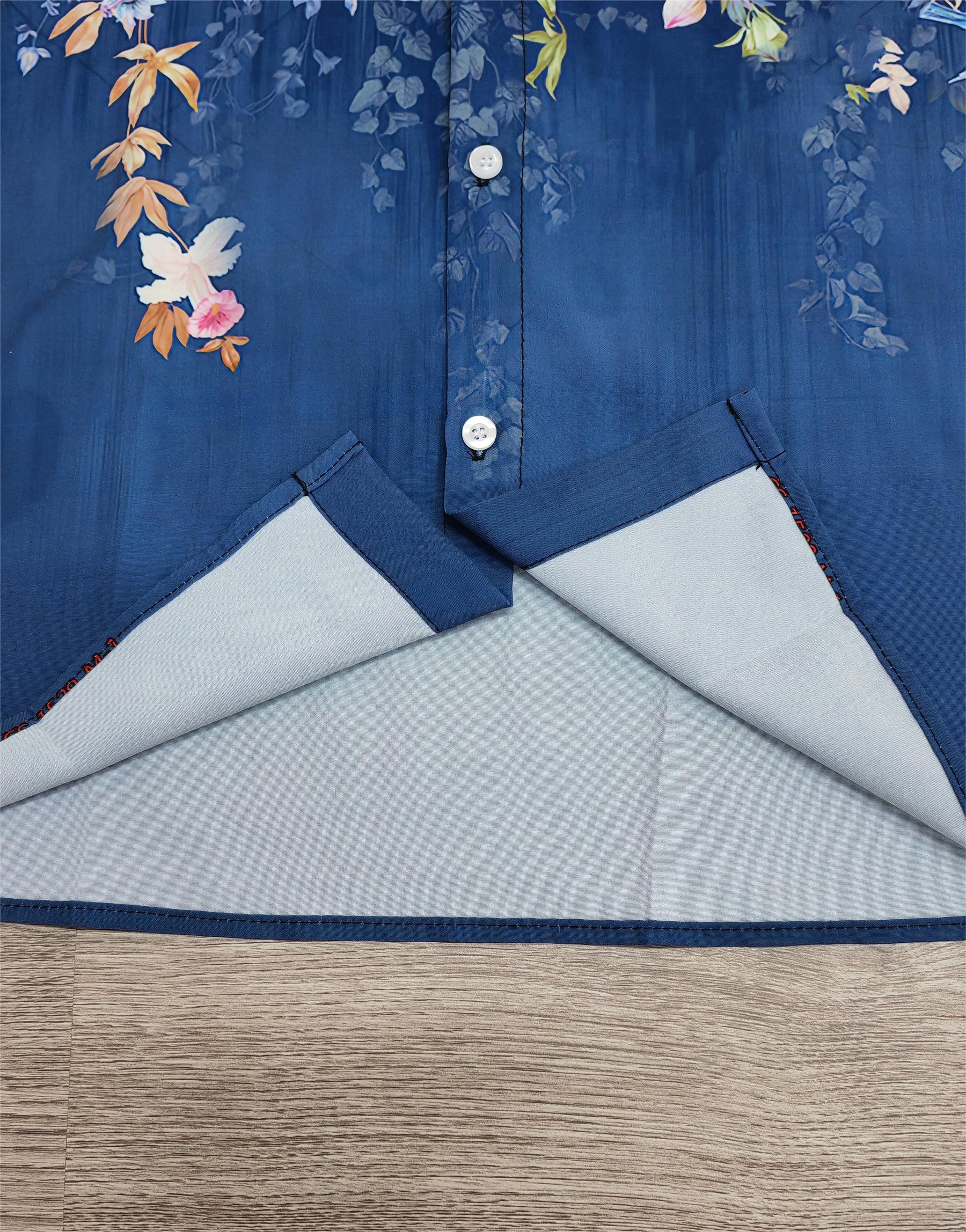 FallStil® - Blauwe blouse met bloemenprint en bladeren