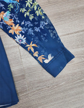 FallStil® - Blauwe blouse met bloemenprint en bladeren