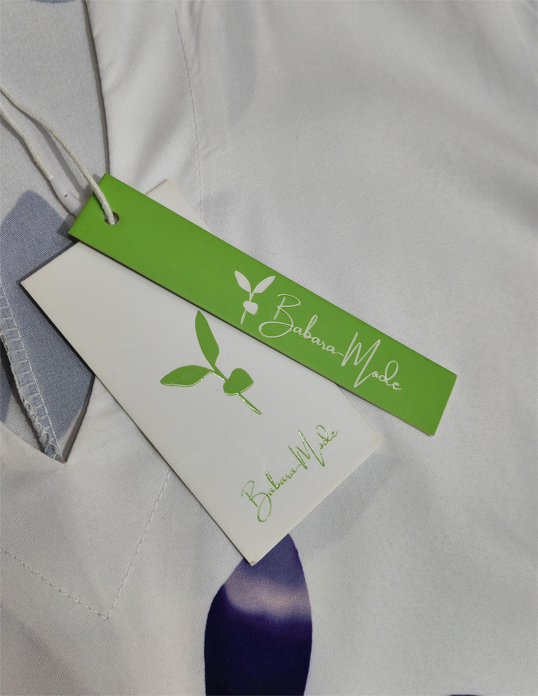 Naturlux® - Midi-jurk met zwart blad T-shirt en zijzakken