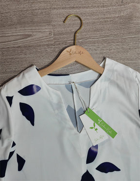 Naturlux® - Midi-jurk met zwart blad T-shirt en zijzakken