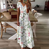 SpringStil® - Witte maxi zomerjurk met V-hals en tuinprint