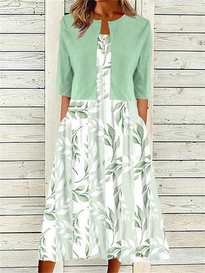 BlossomBliss® - Groene midi-jurk met zijzakken