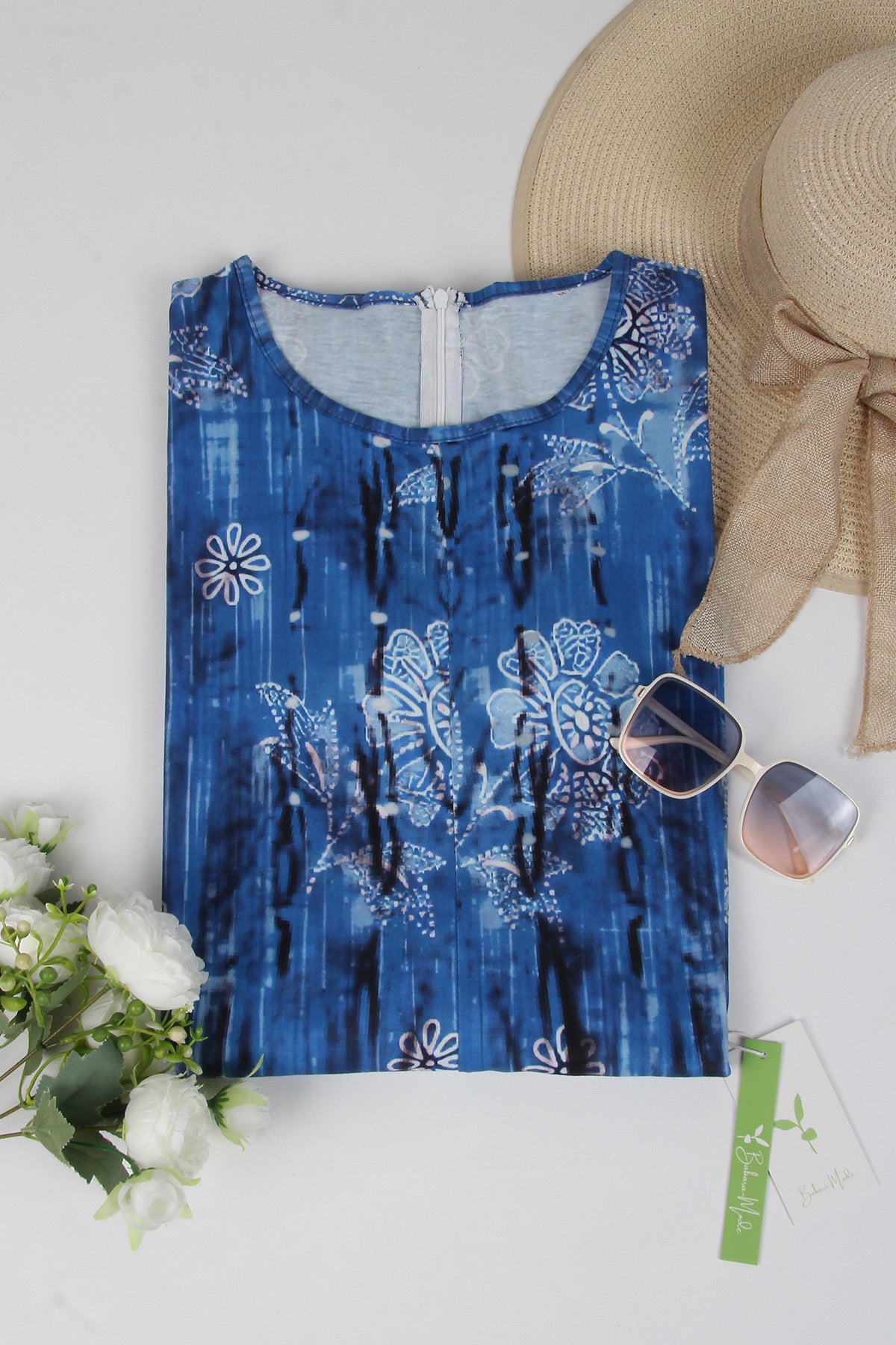 Bloemen blauwe jumpsuit