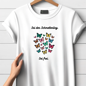 Wees de vlinder, wees een gratis t-shirt