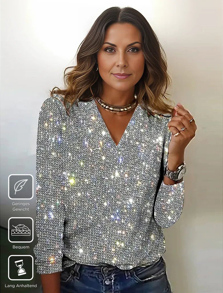 WinterTrend® - Zilver metallic disco glitterprint top met V-hals en lange mouwen