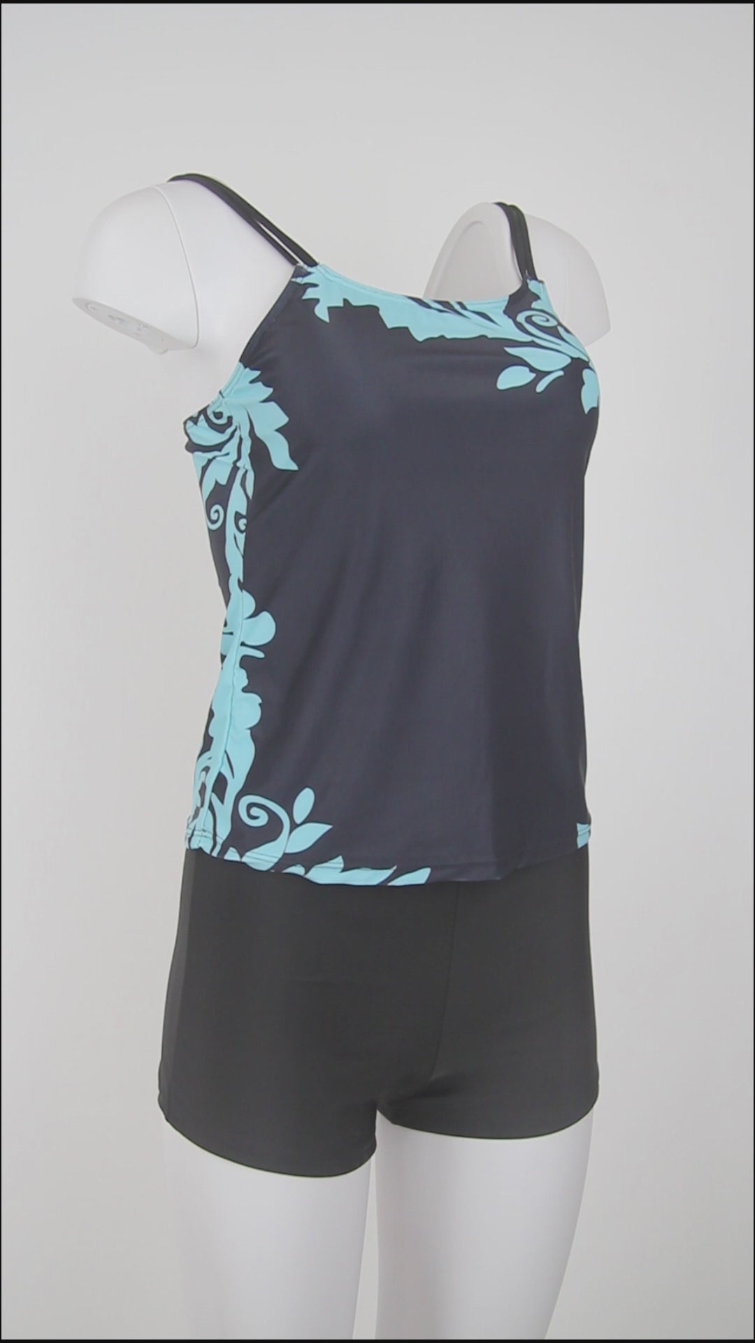 CabanaCouture® - Dromerige mouwloze blauwe zwemkleding met plantenprint